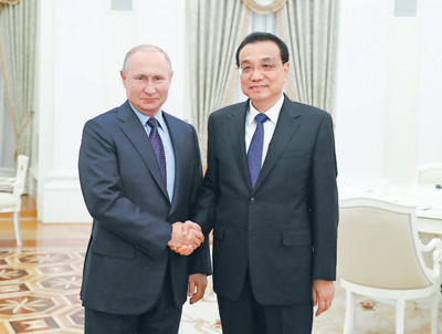 리커창 총리, 푸틴 러시아 대통령과 만나