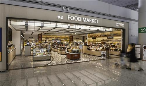 新世界免税店仁川机场分店食品馆，韩国机场免税店红参为中国人最爱。---- 中韩人力网